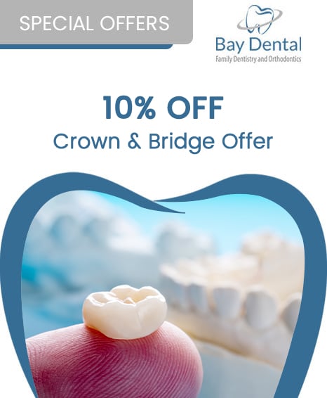 An advertisement for Bay Dental Family Dentistry & Orthodontics, promoting a 10% off Crown & Bridge Offer. 